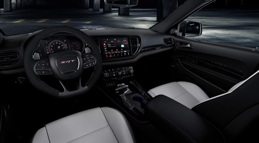 Interior view of the 2026 Dodge Durango front cabin highlighting the 10.1 inch Uconnect 5 touchscreen dashboard