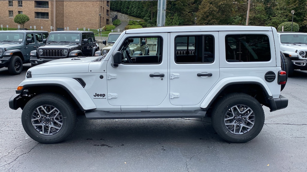 New 2026 Jeep Wrangler 4-DOOR SAHARA Sport Utility