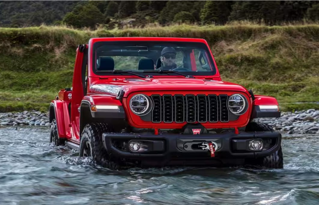 2024 Jeep® Wrangler 4x4 driving in water
