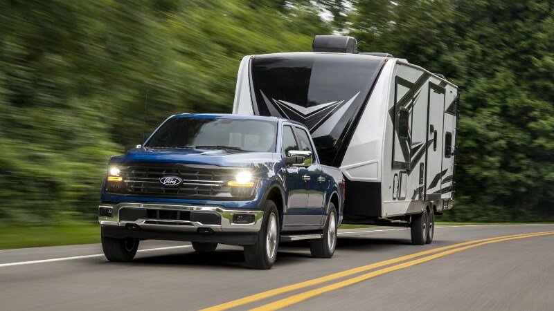2024 Ford F-150 power boost hybrid model towing a trailhome near summit nj