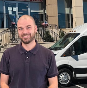 Staff member Tom Wall 3rd from ID_fc56354bfbf9