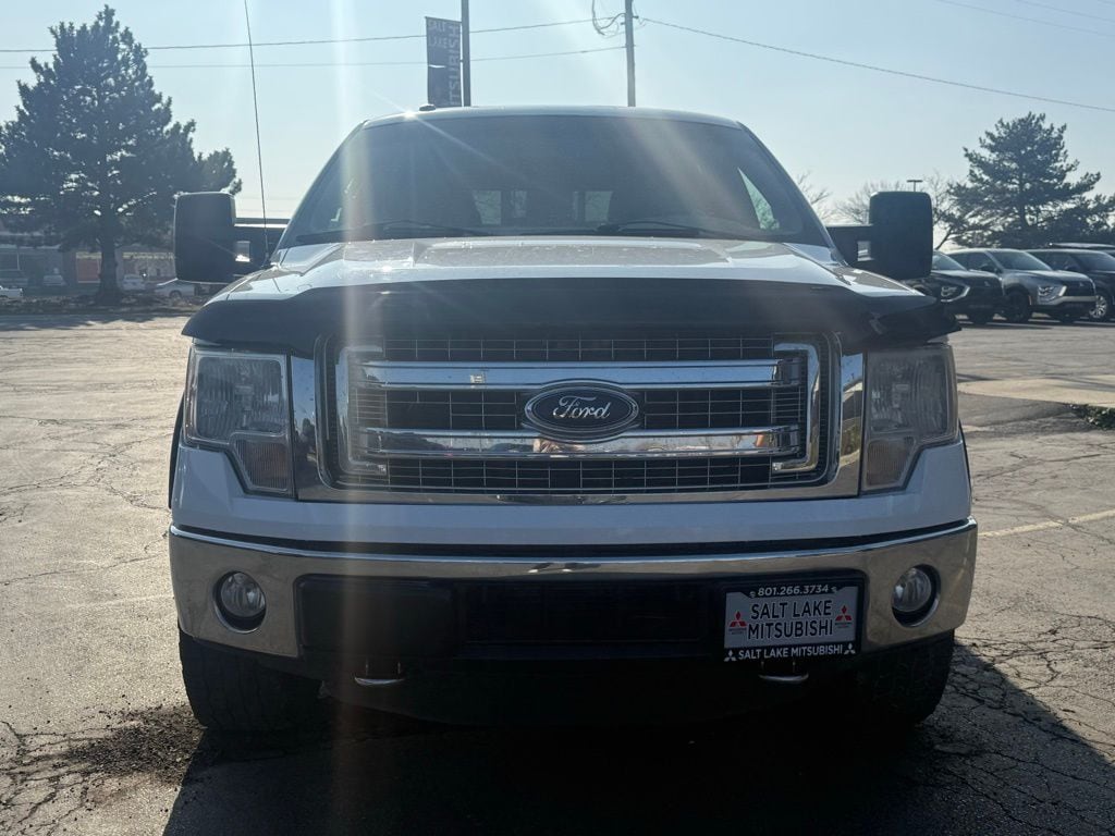 Used 2014 Ford F-150 XLT with VIN 1FTFW1ET0EFA86898 for sale in South Salt Lake, UT