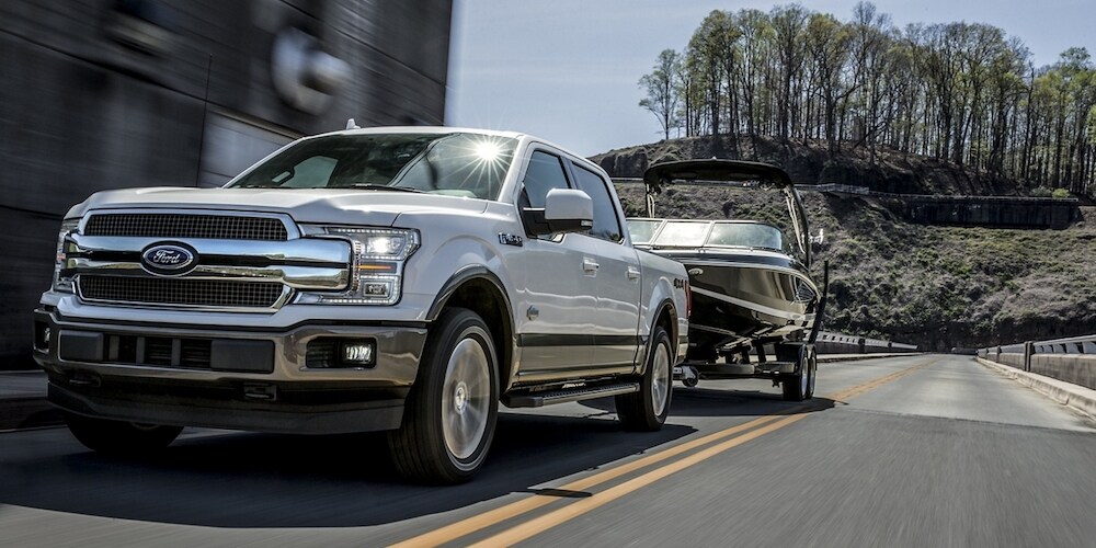 White 2020 Ford F-150 Towing Boat