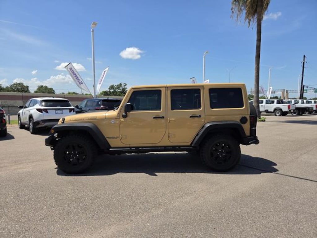 Certified 2013 Jeep Wrangler Unlimited Sahara SUV