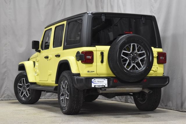 Used 2024 Jeep Wrangler 4-Door Sahara with VIN 1C4PJXEG2RW237383 for sale in Pulaski, WI