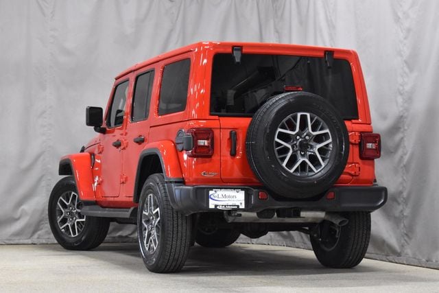 Used 2024 Jeep Wrangler 4-Door Sahara with VIN 1C4PJXEG6RW351449 for sale in Pulaski, WI