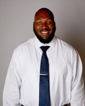 Staff member Gaston Cobb from bfc1a95e3022