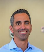Staff member John Arena from ID_3e2bac