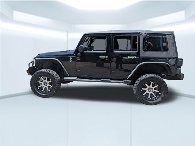 Used 2012 Jeep Wrangler Unlimited Sport with VIN 1C4HJWDG8CL135644 for sale in Daphne, AL