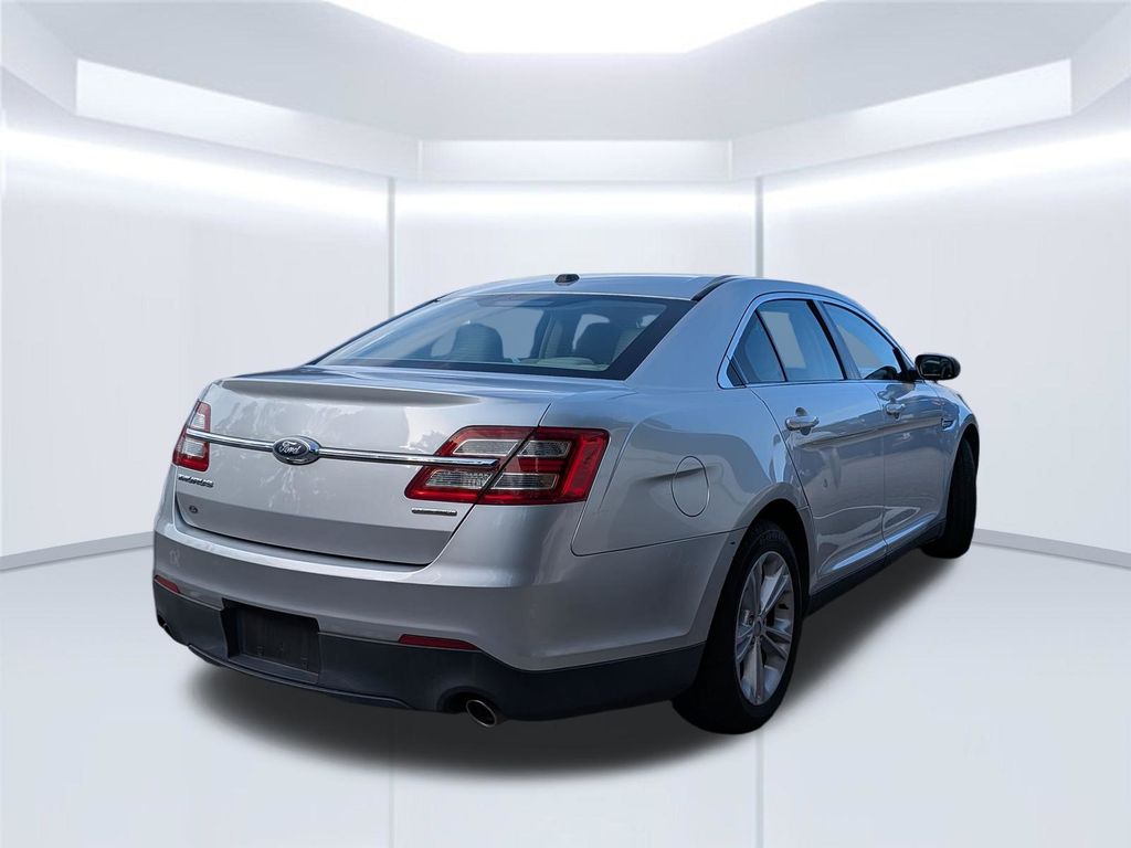 Used 2016 Ford Taurus SE with VIN 1FAHP2D8XGG156712 for sale in Daphne, AL