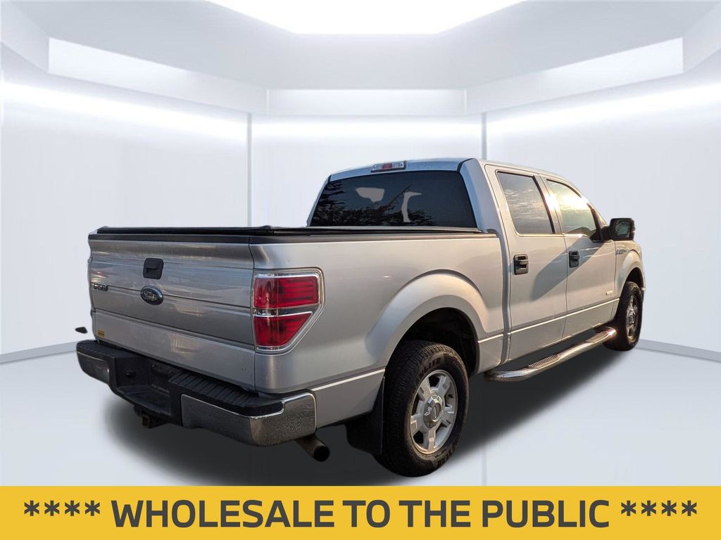 Used 2013 Ford F-150 XLT with VIN 1FTFW1CT0DFB23918 for sale in Daphne, AL