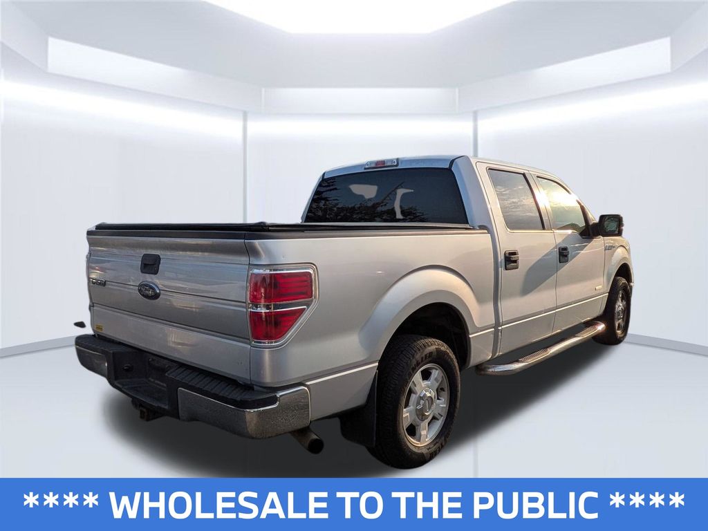 Used 2013 Ford F-150 XLT with VIN 1FTFW1CT0DFB23918 for sale in Daphne, AL