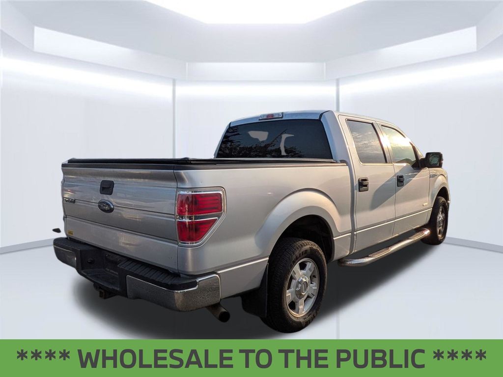 Used 2013 Ford F-150 XLT with VIN 1FTFW1CT0DFB23918 for sale in Daphne, AL