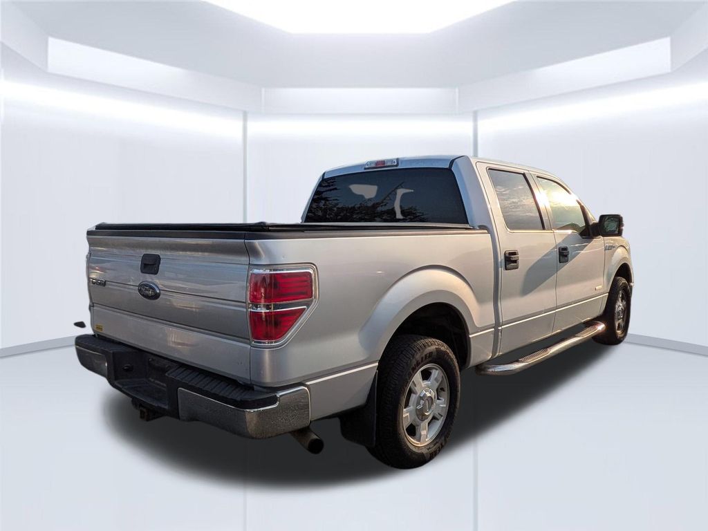 Used 2013 Ford F-150 XLT with VIN 1FTFW1CT0DFB23918 for sale in Daphne, AL