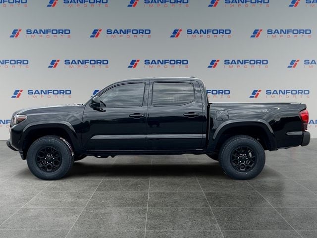 Used third-generation Toyota Tacoma SR5 V6 Double Cab exterior at Sanford Imports near Raleigh, NC