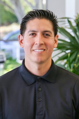 Staff member Andrew Uribe from ID_b56a88ab8b67