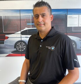 Staff member Alex Macias from ID_392b97c38ec8