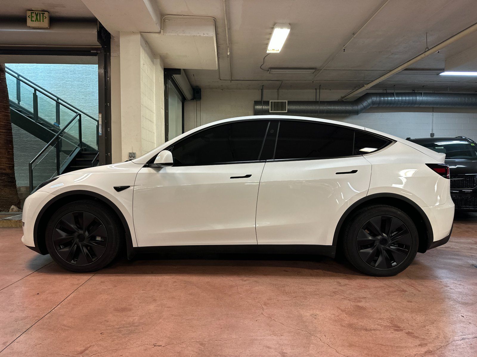 Used 2024 Tesla Model Y Long Range with VIN 7SAYGDEE1RF180293 for sale in Santa Monica, CA