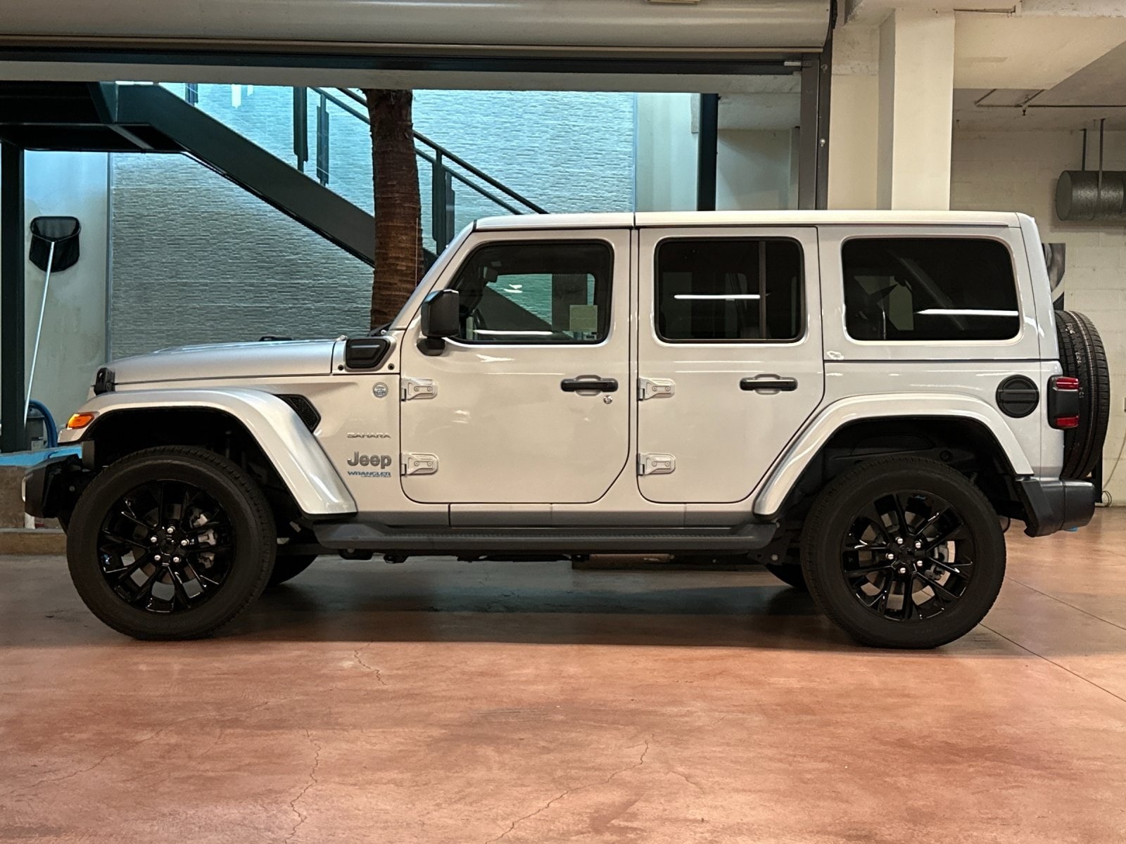 Certified 2022 Jeep Wrangler Unlimited Sahara 4XE with VIN 1C4JJXP64NW178776 for sale in Santa Monica, CA