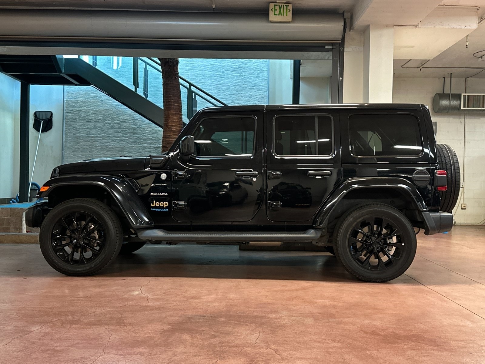 Certified 2022 Jeep Wrangler Unlimited Sahara 4XE with VIN 1C4JJXP60NW199009 for sale in Santa Monica, CA