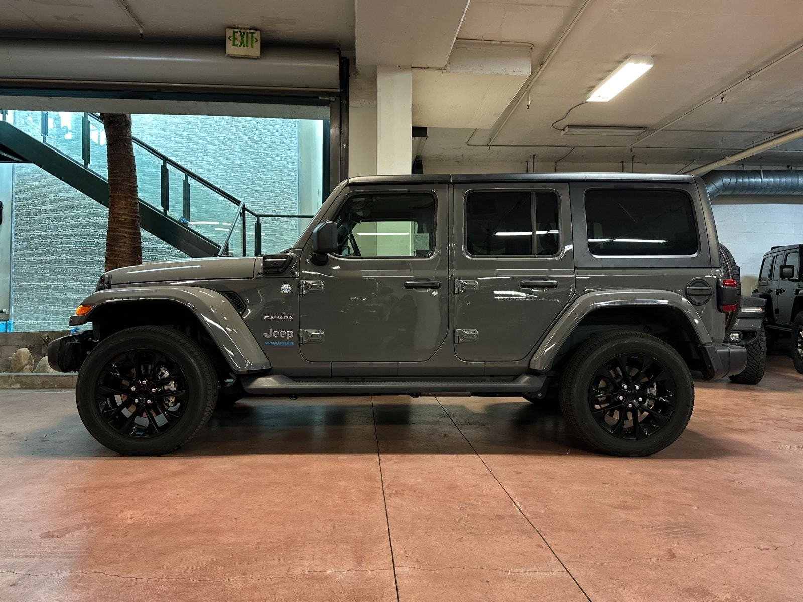 Certified 2022 Jeep Wrangler Unlimited Sahara 4XE with VIN 1C4JJXP61NW103274 for sale in Santa Monica, CA