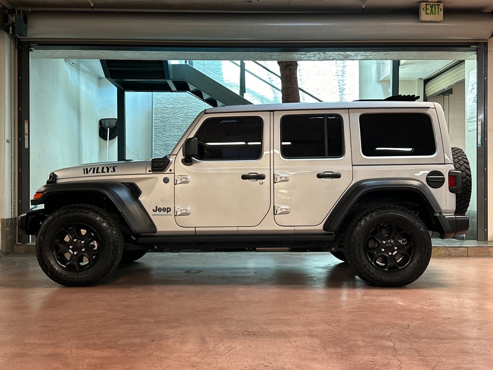 Used 2023 Jeep Wrangler 4xe Willys 4XE with VIN 1C4JJXN64PW610563 for sale in Santa Monica, CA
