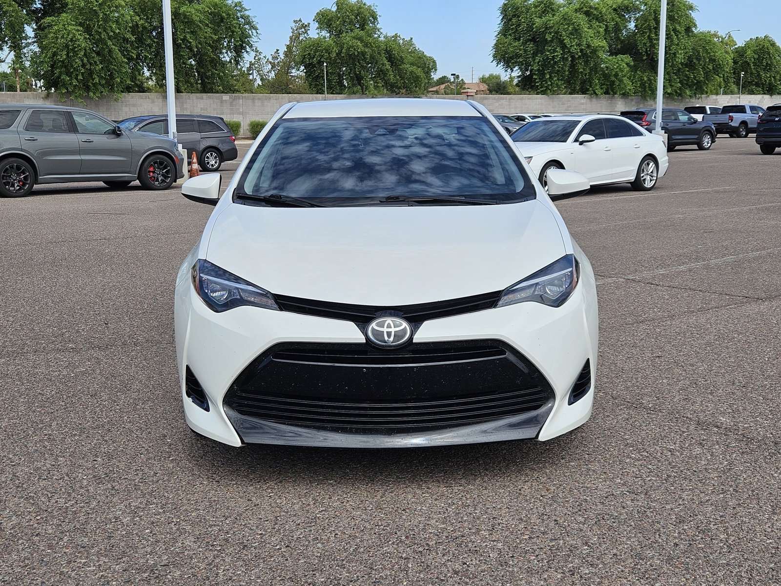 Used 2017 Toyota Corolla LE with VIN 5YFBURHE8HP737014 for sale in Chandler, AZ