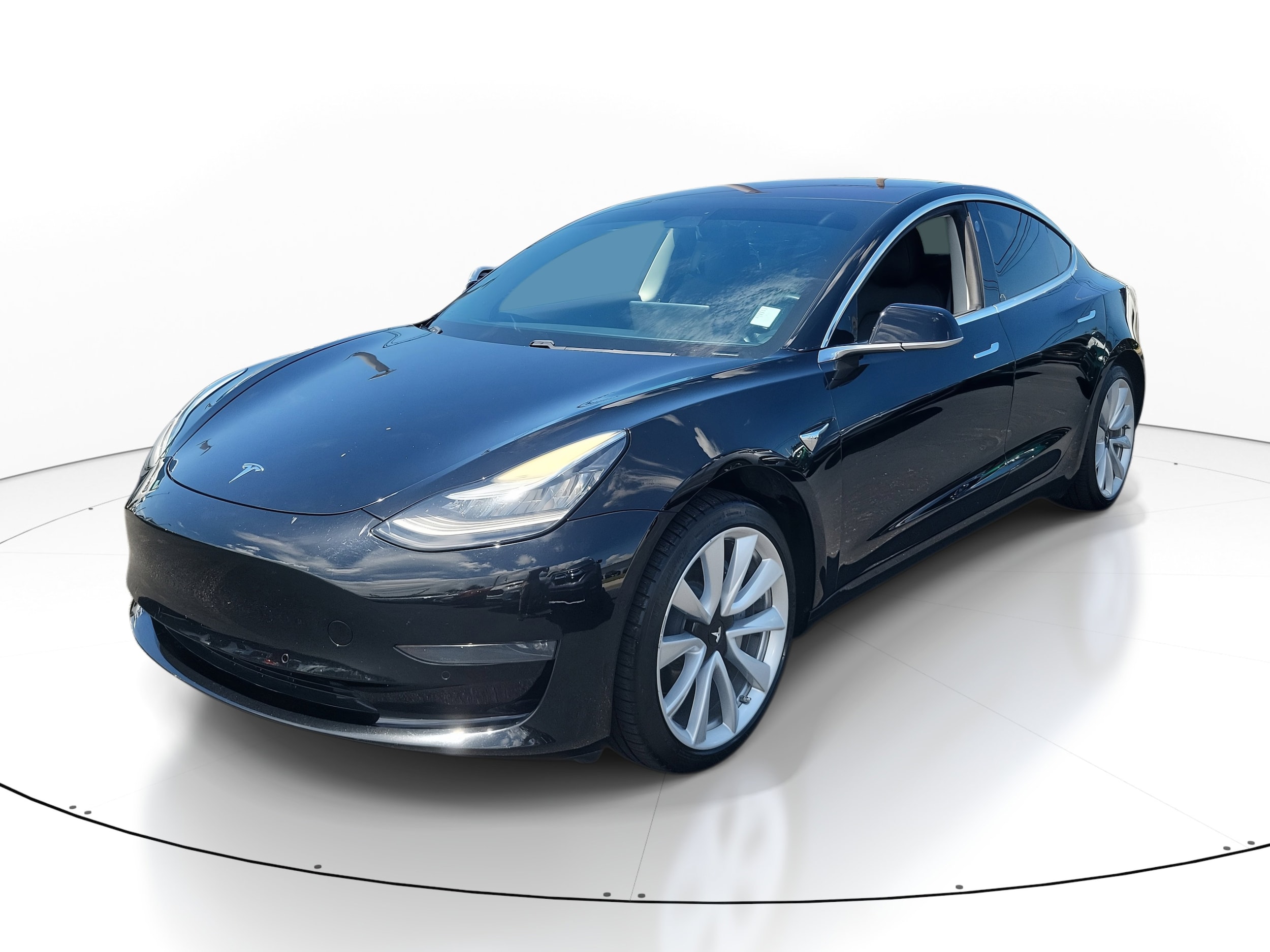 Used 2018 Tesla Model 3 Long Range with VIN 5YJ3E1EAXJF005828 for sale in Sarasota, FL