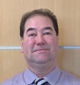 Staff member Chuck Mickey from 754bcef92975