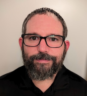 Staff member Bryan Grismala from ad801d275271