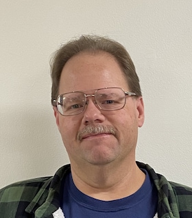 Staff member Mark Fox from ad801d275271