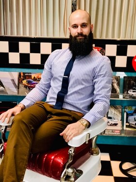 Staff member Eric J. Sasso from 5bf41264b119