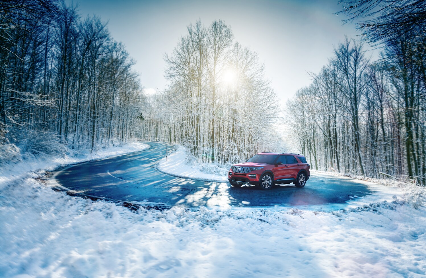 NewFordExplorerSnowyWindyRoad.png