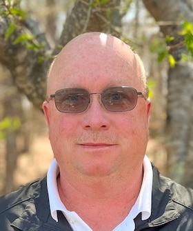 Staff member CHRIS AMBURN from afcb18588ac5