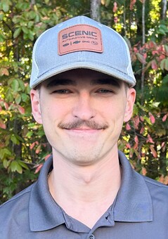 Staff member Alex Burns from 6197a872a8c8