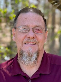 Staff member Chris Scott from 6c90bbb44cc2