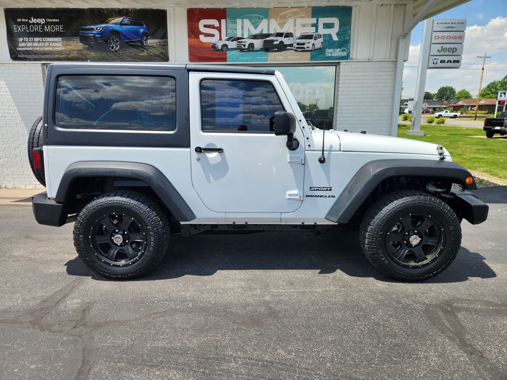 Used 2013 Jeep Wrangler Sport with VIN 1C4AJWAG7DL591867 for sale in Willard, OH
