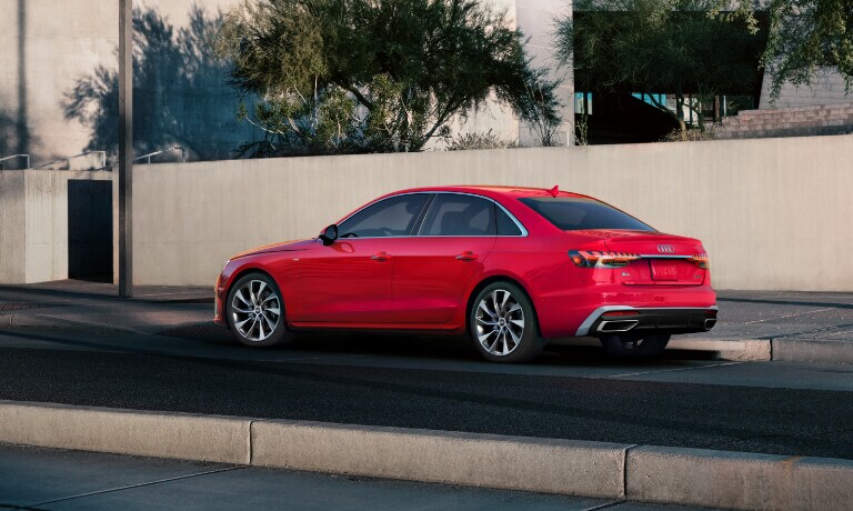 Red 2020 Audi A4 parked on the side of the road