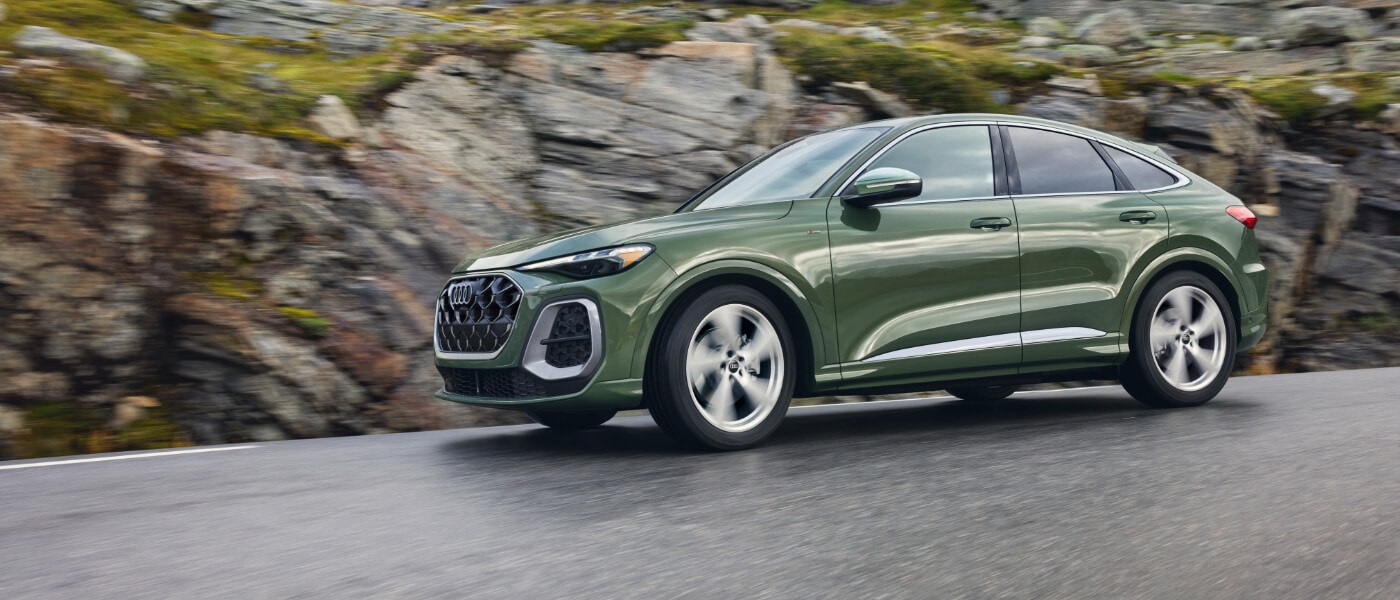 2025 Audi Q5 Sportback Exterior Driving Around Curve