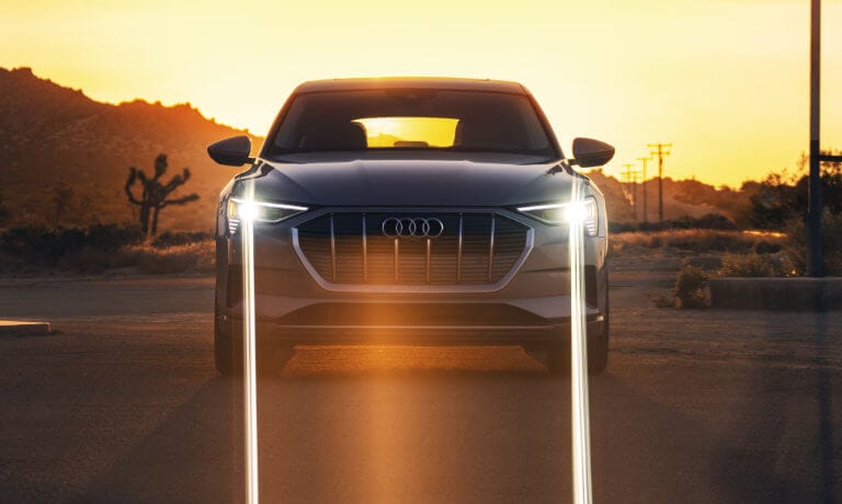 2023 Audi e-tron® Sportback exterior head on at night