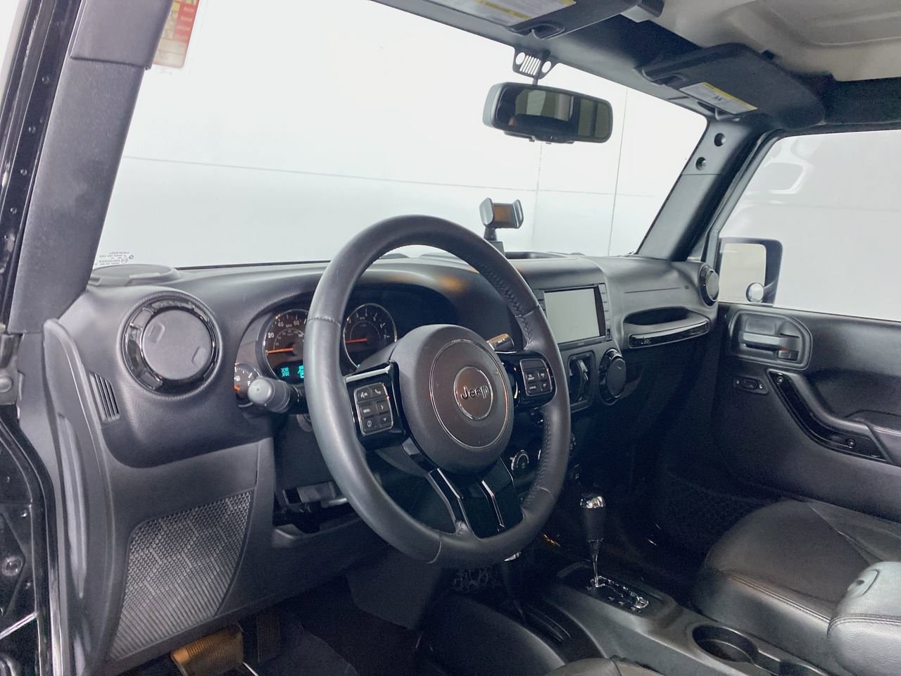 Used 2015 Jeep Wrangler Unlimited Altitude with VIN 1C4BJWEG1FL683977 for sale in Hoffman Estates, IL
