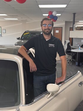 Staff member Max Mitchell from 5534d536ddbd