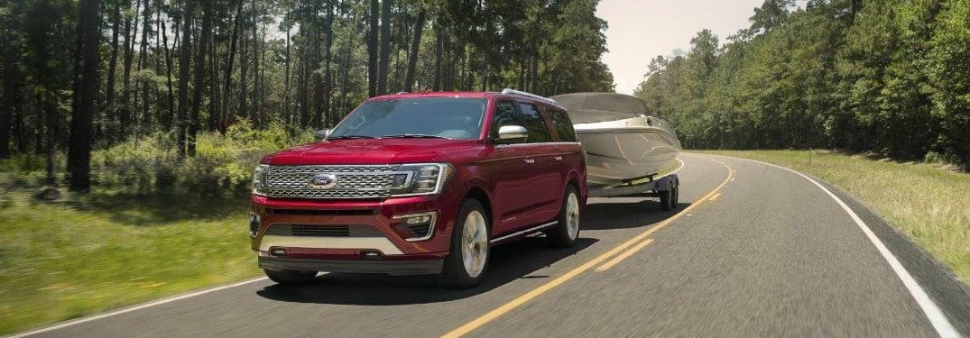 2018-Ford-Expedition-Towing-a-Boat-Down-a-Highway_o.jpg