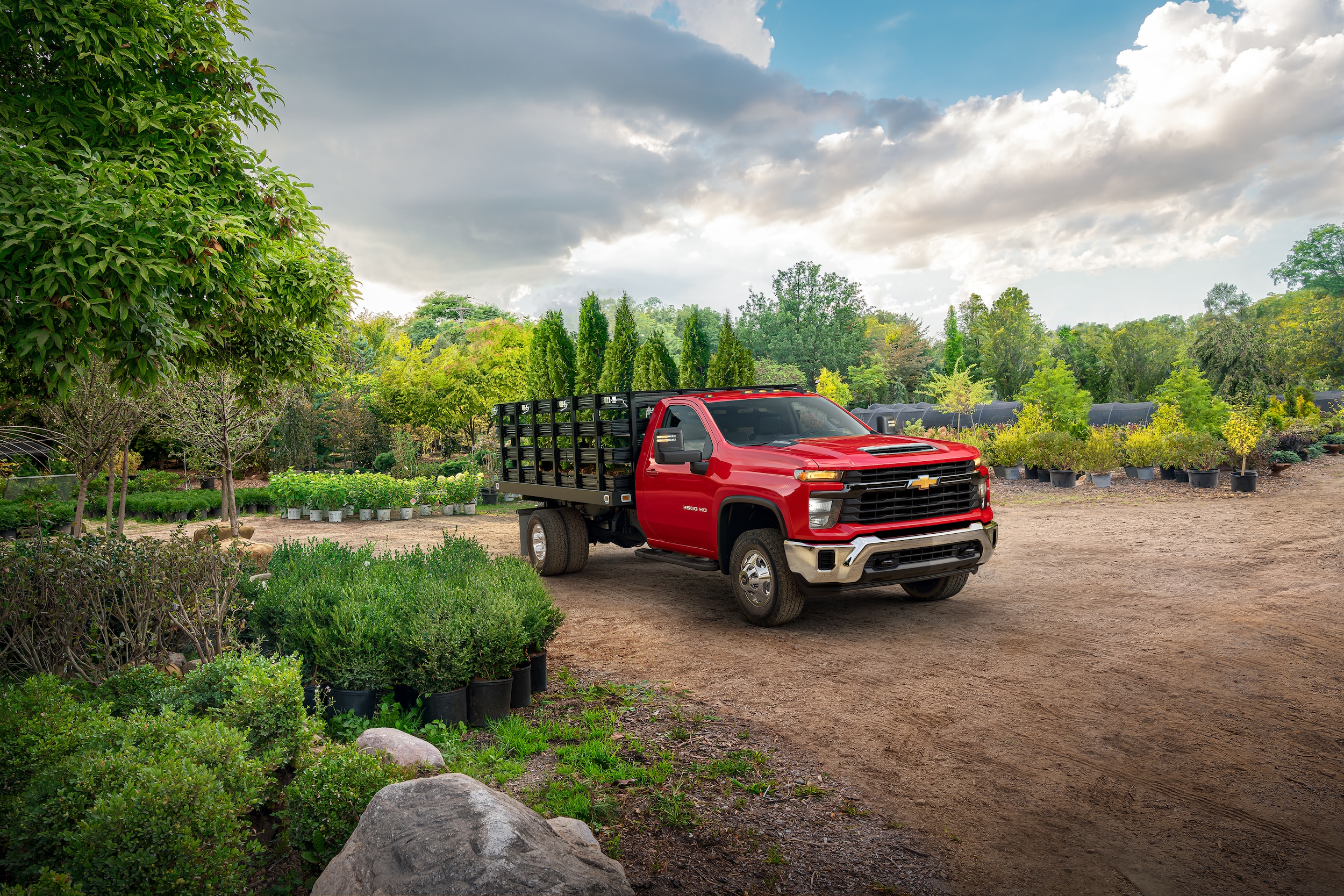  Person cheerfully signing documents.