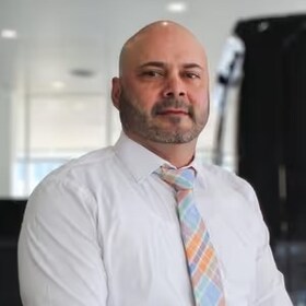 Staff member Louis Torres from ID_82b7ae