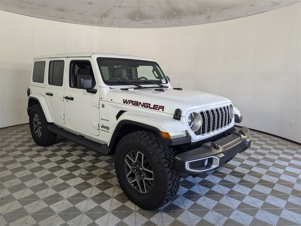 Used 2024 Jeep Wrangler 4-Door Sahara with VIN 1C4PJXENXRW100982 for sale in Delray Beach, FL