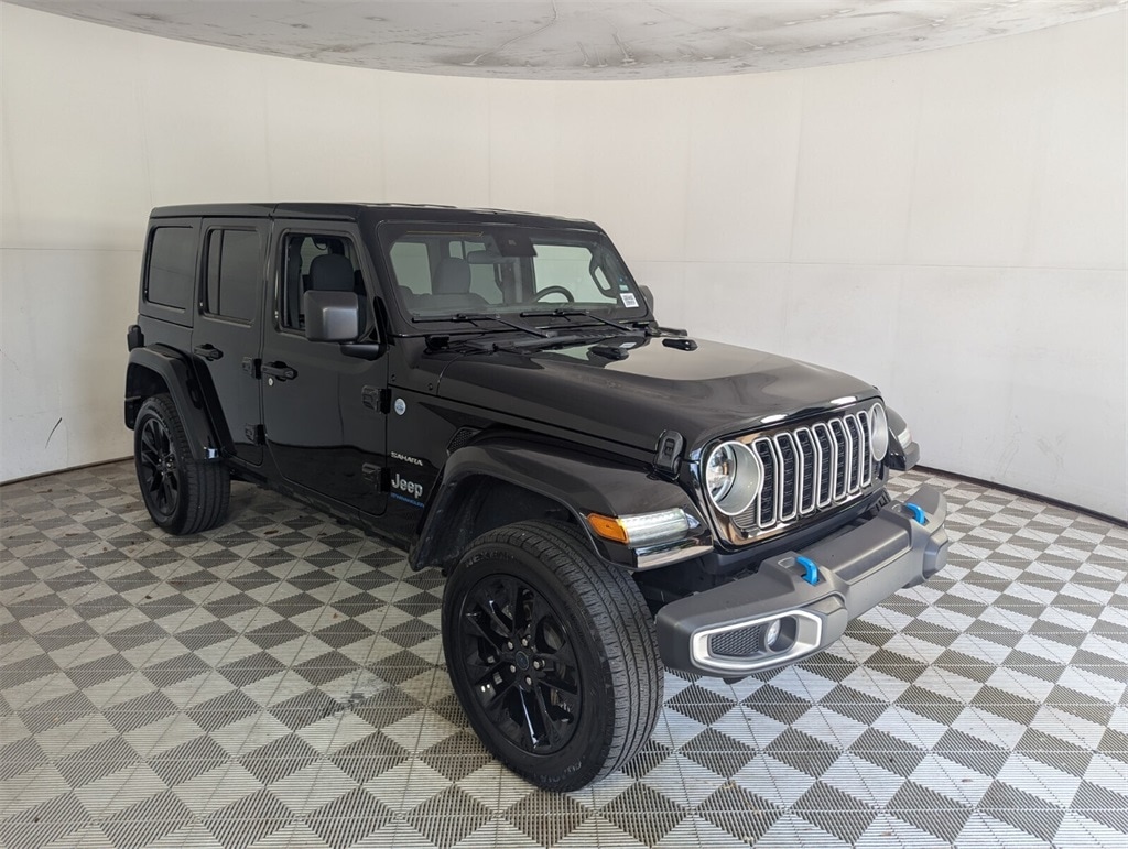 Used 2024 Jeep Wrangler 4xe Sahara 4XE with VIN 1C4RJXP6XRW153857 for sale in Delray Beach, FL