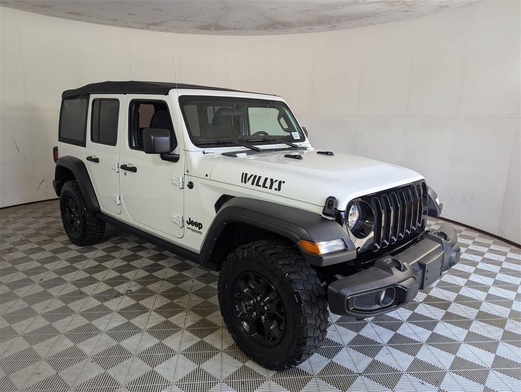 Used 2022 Jeep Wrangler Unlimited Willys Sport with VIN 1C4HJXDN1NW246140 for sale in Delray Beach, FL