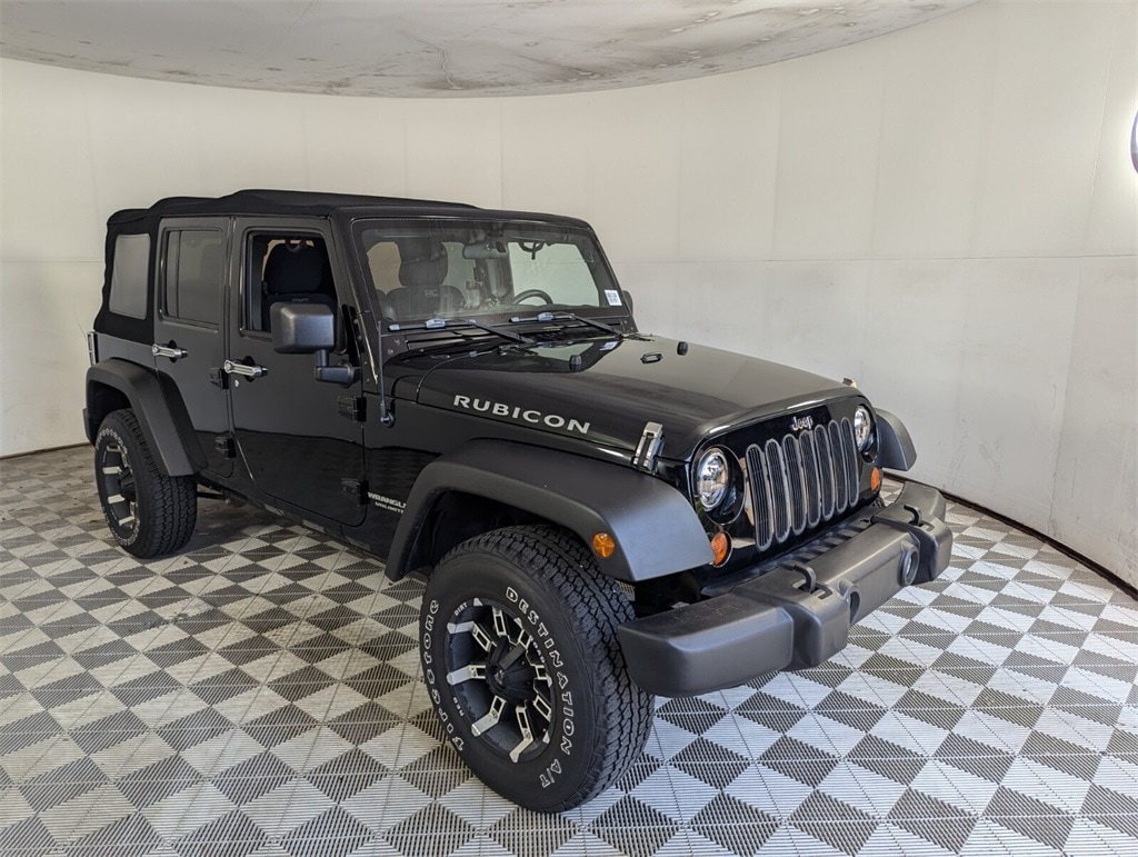 Used 2012 Jeep Wrangler Unlimited Rubicon with VIN 1C4BJWFG6CL157161 for sale in Delray Beach, FL