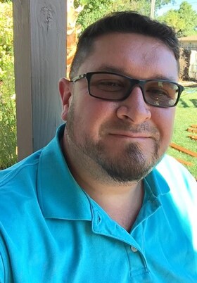 Staff member Cesar Perez from ID_a9554a399e34